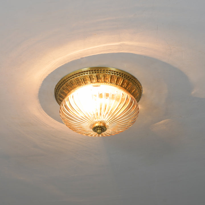 HINKLEY Single Light Flush Mount Ceiling Light in Antique Brass Finish with Amber Rippled Glass