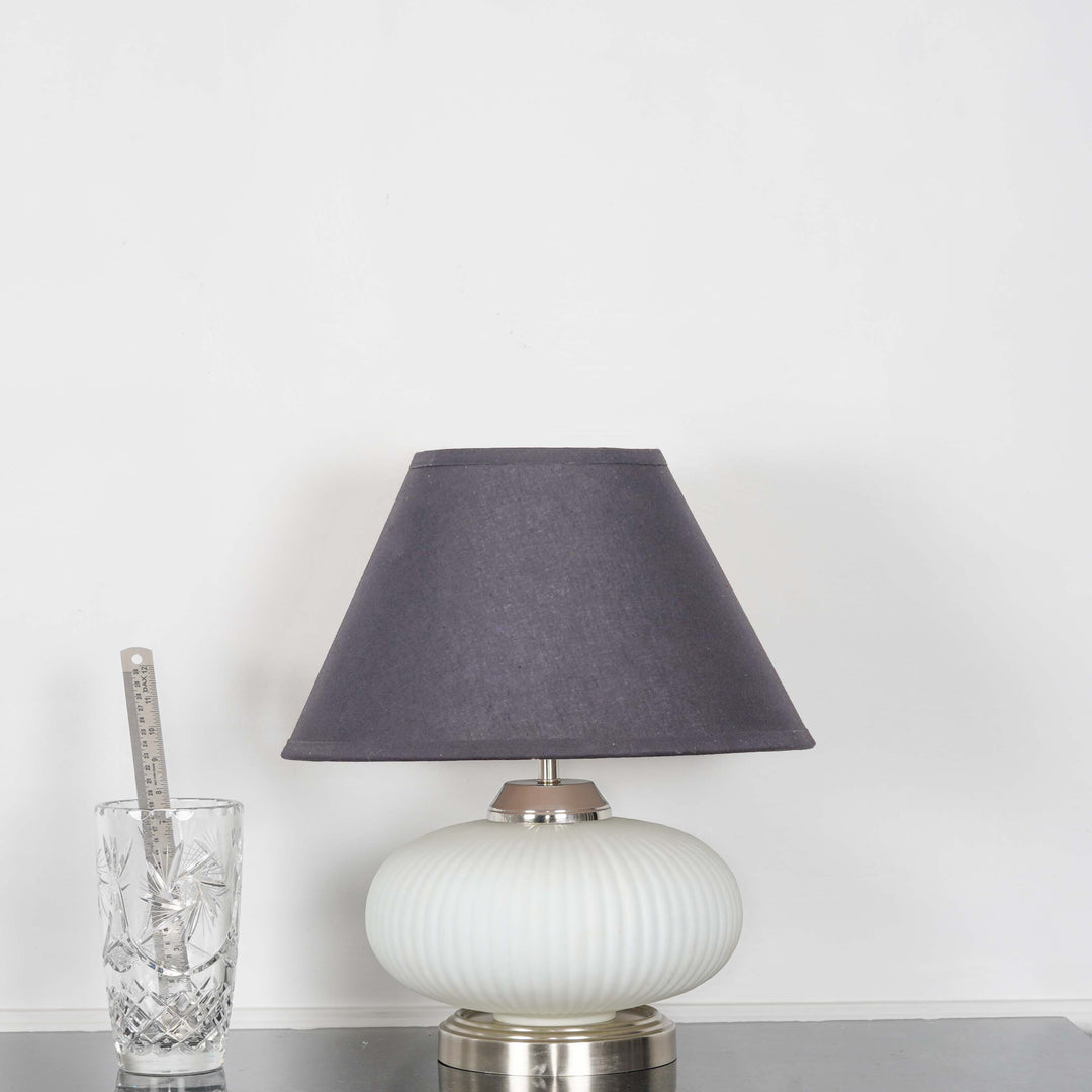 MALOTO Frosted White Glass and Chrome Finish Metal Table Lamp With Beige Cotton Shade