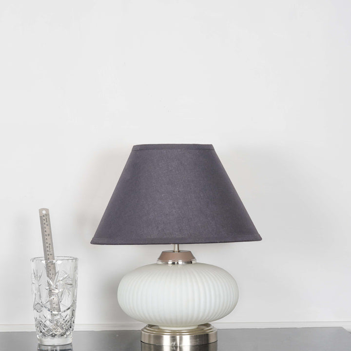 MALOTO Frosted White Glass and Chrome Finish Metal Table Lamp With Beige Cotton Shade