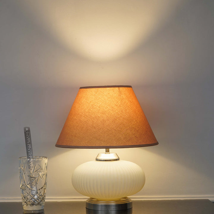 MALOTO Frosted White Glass and Chrome Finish Metal Table Lamp With Beige Cotton Shade