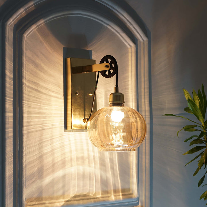 AMBRE Single Light Wall Light In Amber & Brass Finish