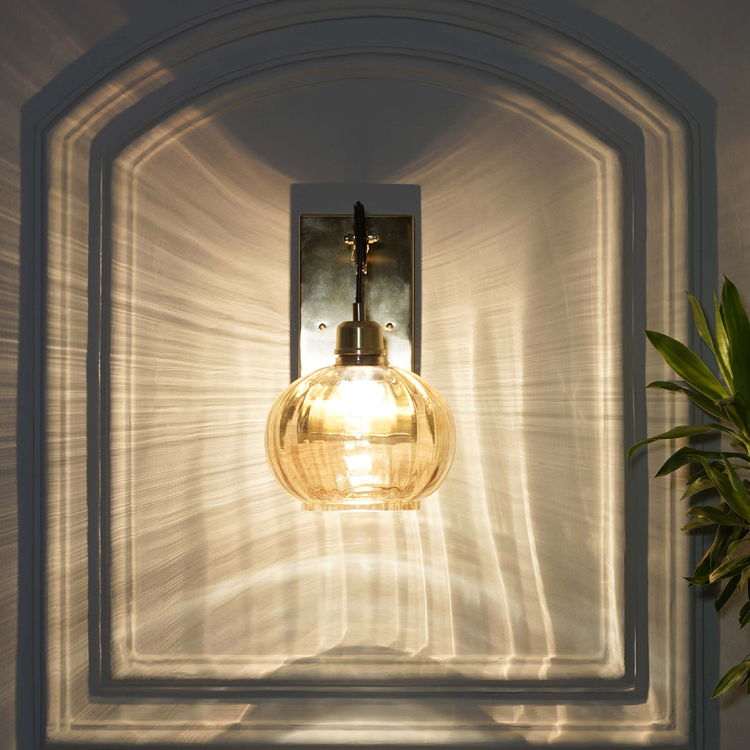 AMBRE Single Light Wall Light In Amber & Brass Finish