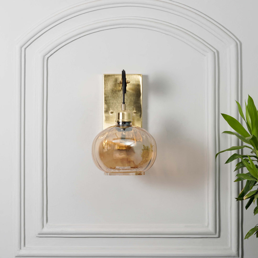 AMBRE Single Light Wall Light In Amber & Brass Finish
