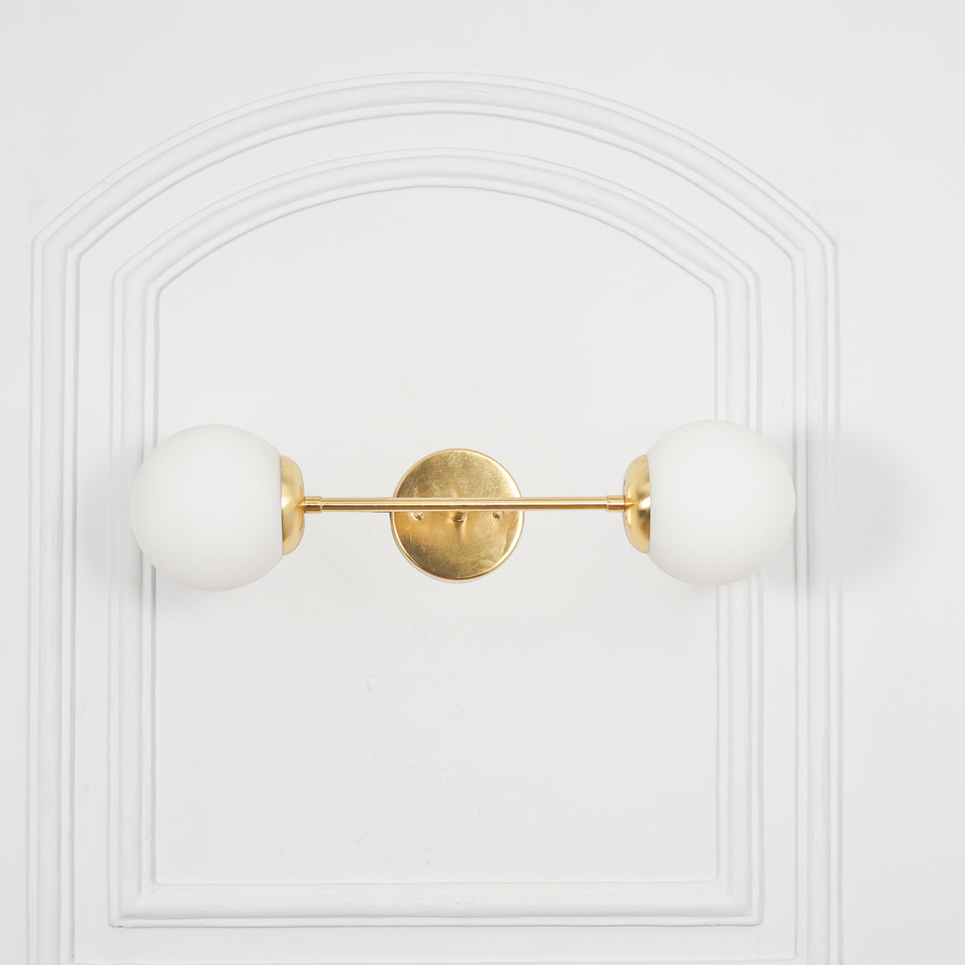 BALTS Twin Wall Mirror Light in Shine Brass Finish with Opal Glass Globe Shades