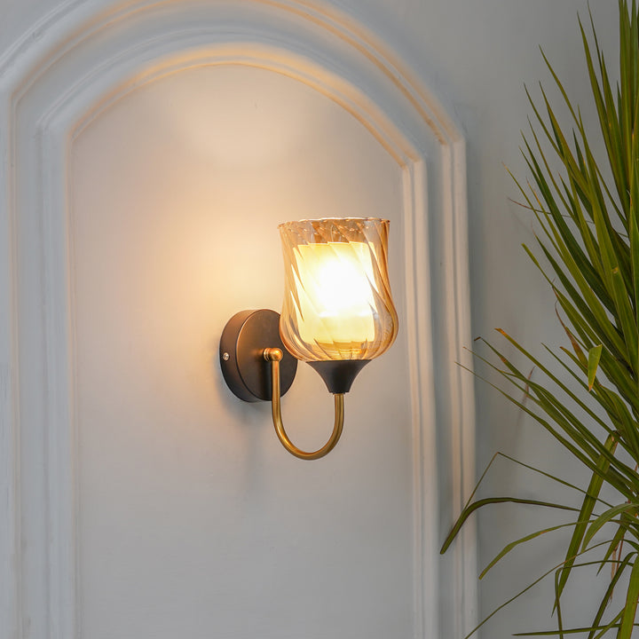 FLORIAN Single Light Wall Fitting In Black And Brass  Finish Metal With Amber Glass