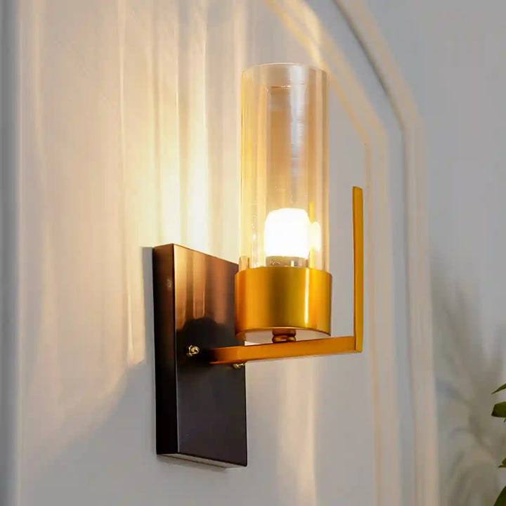 Grove Amber Glass and Aqtique Brass Finish Wall Light